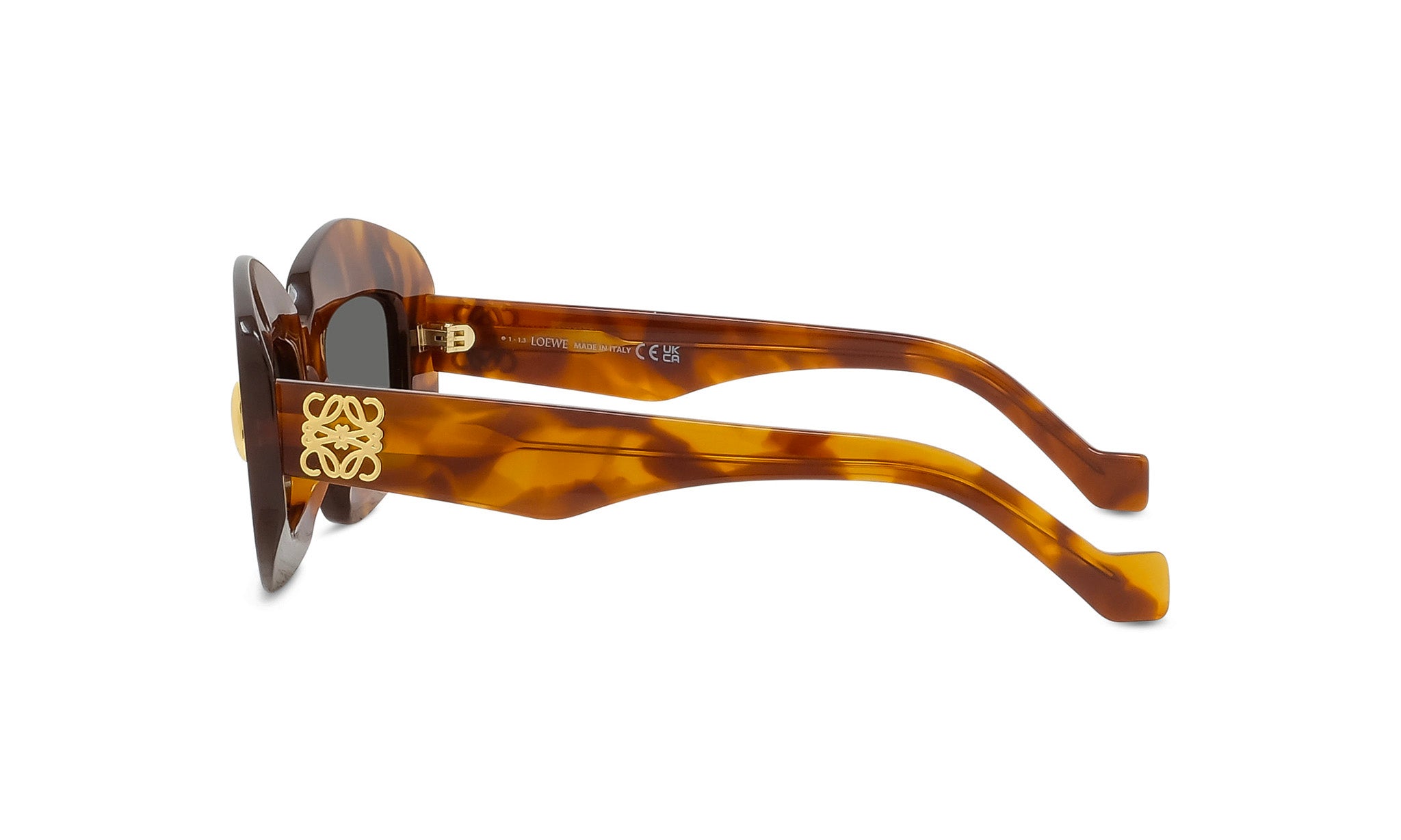 A pair of brown sunglasses with a gold logo on the frame.