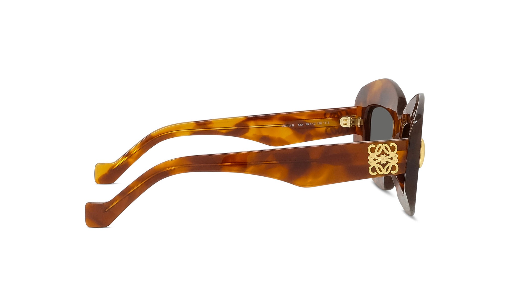 A pair of brown sunglasses with a gold logo on the frame.
