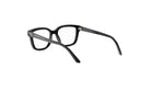 A pair of black-framed glasses with gold accents, positioned on a white background.