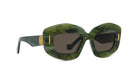 A pair of stylish sunglasses with a green and black color scheme and gold accents.