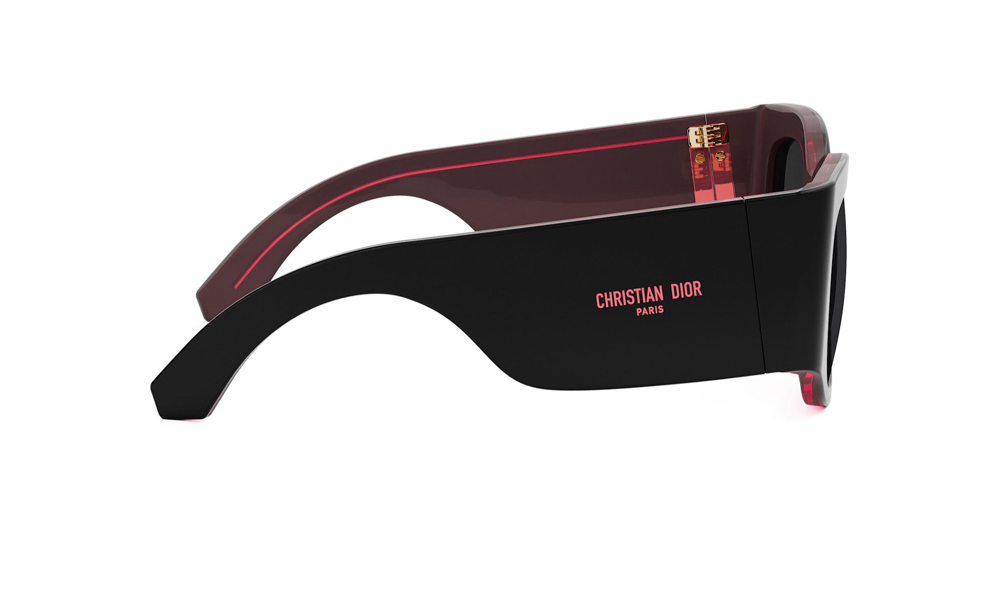 A pair of black sunglasses with a red frame and the logo of Christian Dior on the side.