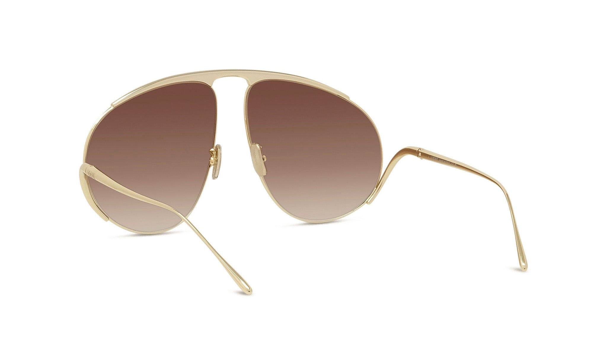A pair of gold-colored sunglasses with a unique, avant-garde design.