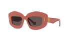 A pair of pink sunglasses with dark lenses.