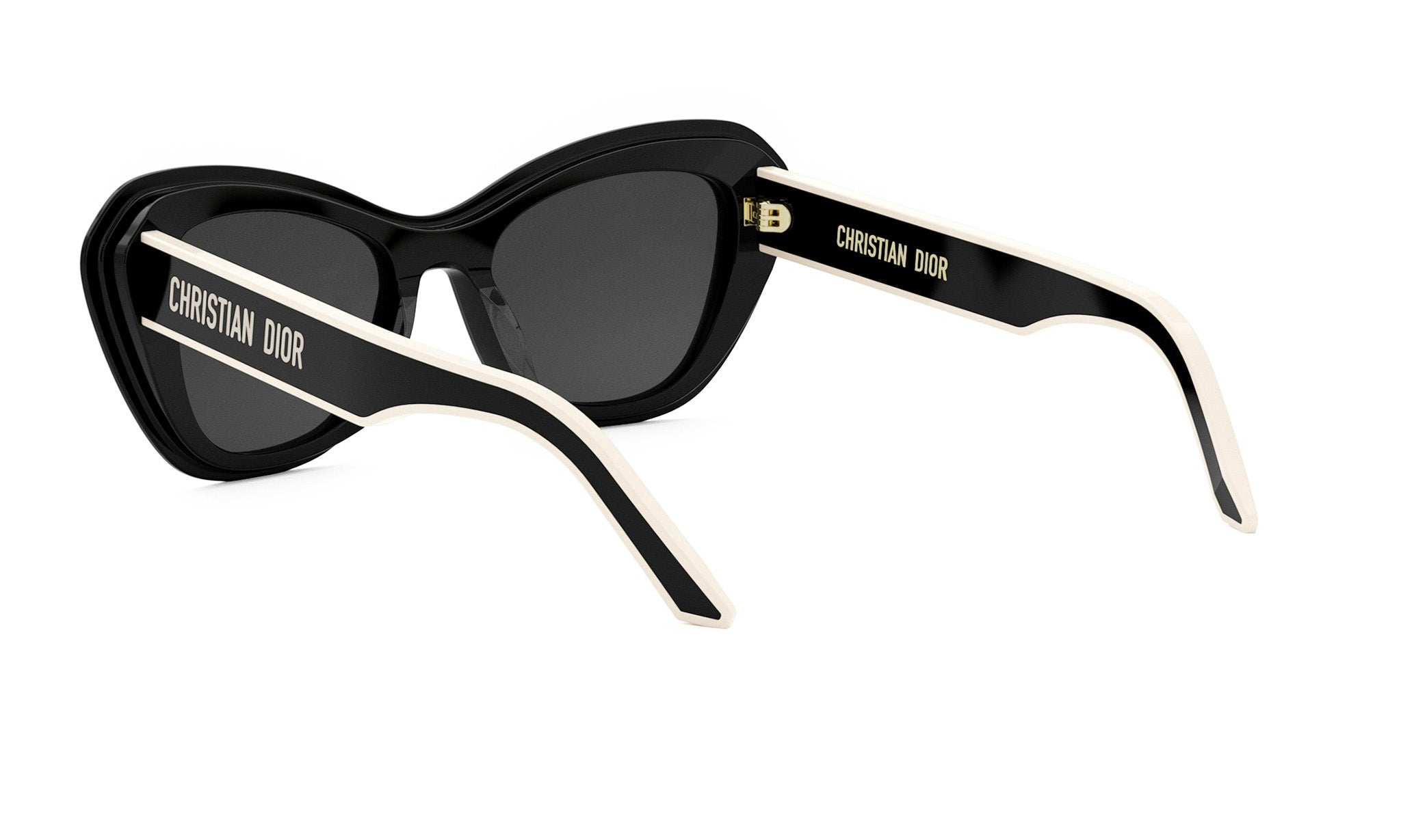 A pair of black cat-eye sunglasses with white accents, featuring the brand name "CHRISTIAN DOR" on the frame.