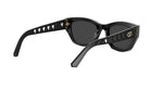 A pair of black sunglasses with a gold-colored frame and a diamond pattern on the side.