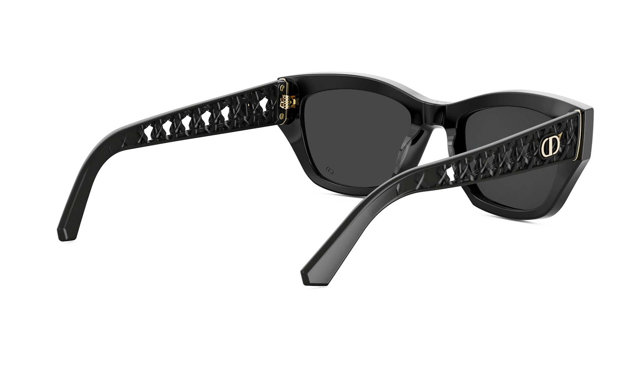 A pair of black sunglasses with a gold-colored frame and a diamond pattern on the side.