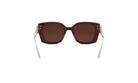 A pair of brown sunglasses with gold accents, featuring a dark frame and dark lenses.