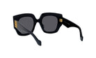 A pair of black sunglasses with gold accents, featuring a square frame and dark lenses.