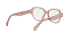 A pair of pink-tinted glasses with a clear lens, featuring a sleek and modern design.