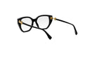 A pair of black-framed glasses with gold accents, positioned in a way that they appear to be facing away from the camera.