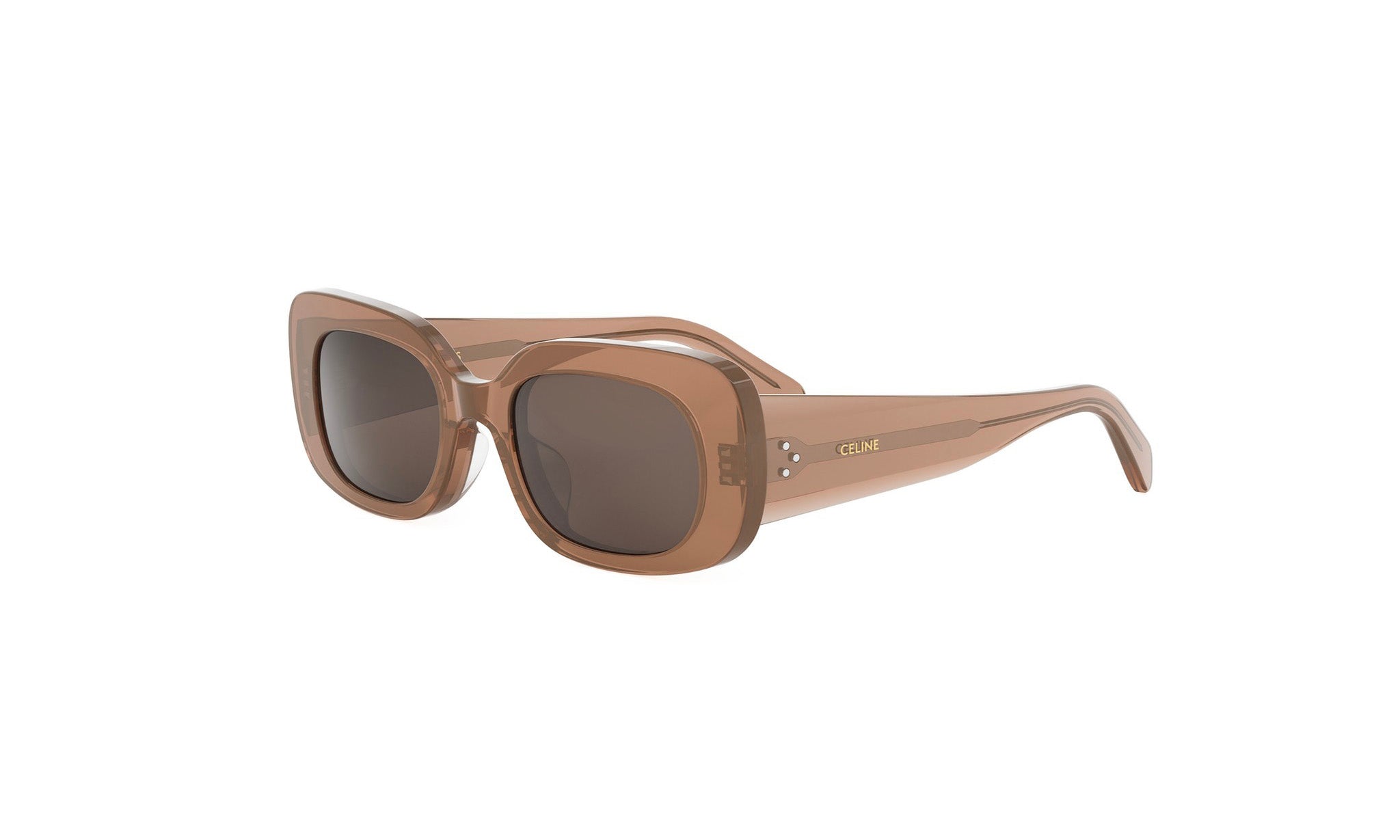 A pair of tan-colored sunglasses with a Celine logo on the frame.