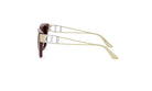 A pair of stylish sunglasses with a gold frame and dark brown temples.