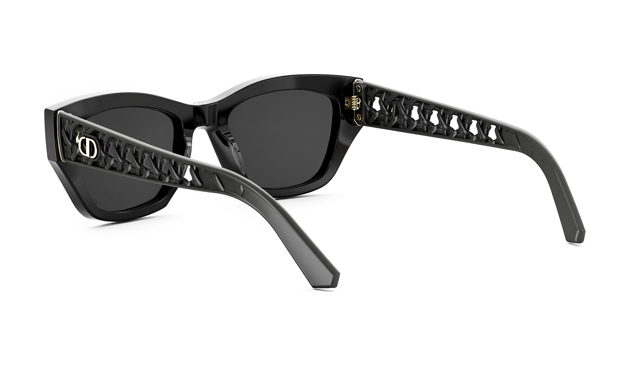 A pair of black sunglasses with a unique, intricate design on the frame.