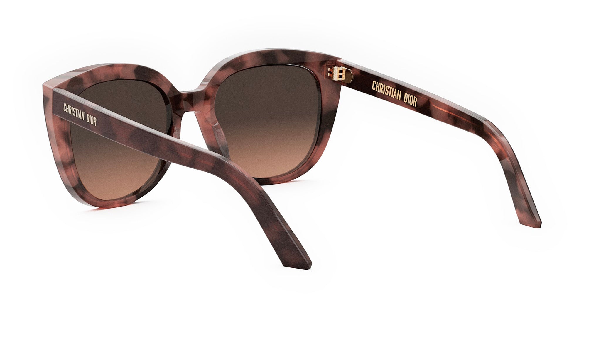 A pair of brown sunglasses with the Christian Dior logo on the temples.