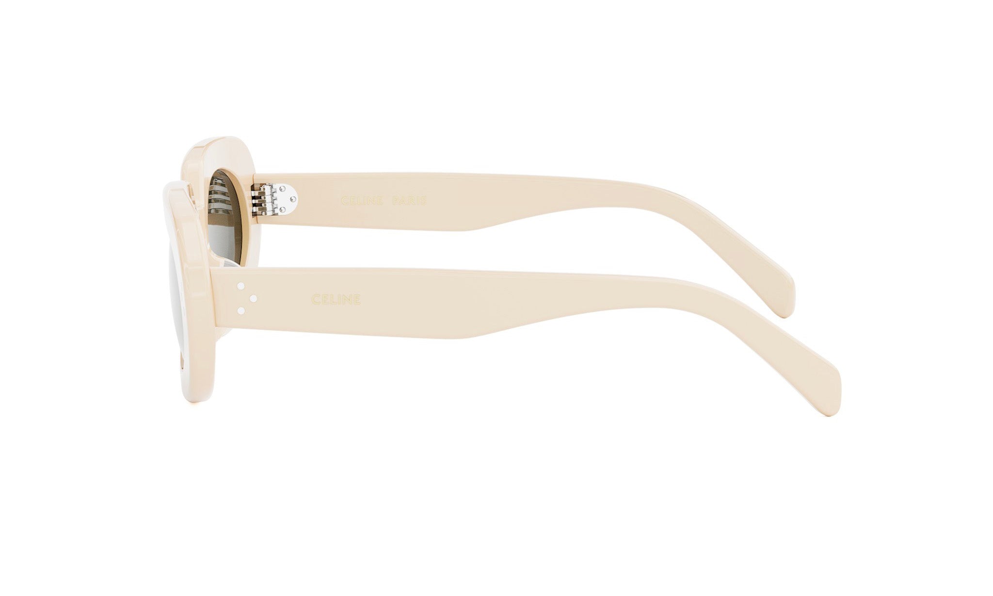 A pair of cream-colored sunglasses with the brand name "Celine" printed on the frame.
