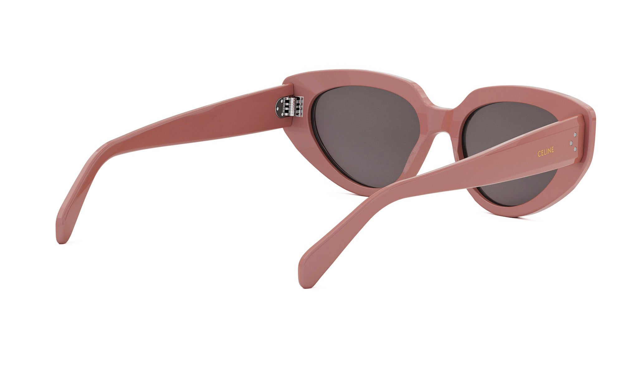 A pair of pink cat-eye sunglasses with dark lenses.