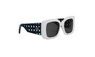 A pair of stylish sunglasses with a white frame and dark blue patterned accents.