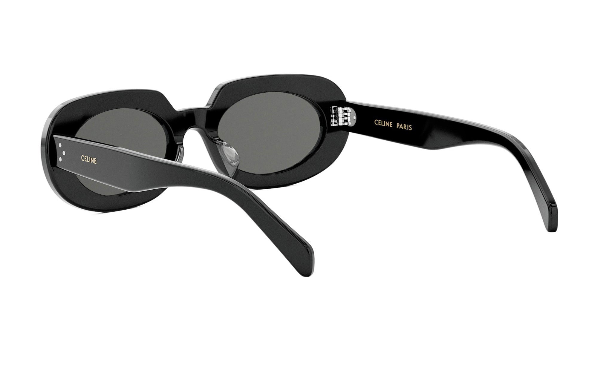 A pair of black sunglasses with the brand name "Celine Paris" printed on the frame.