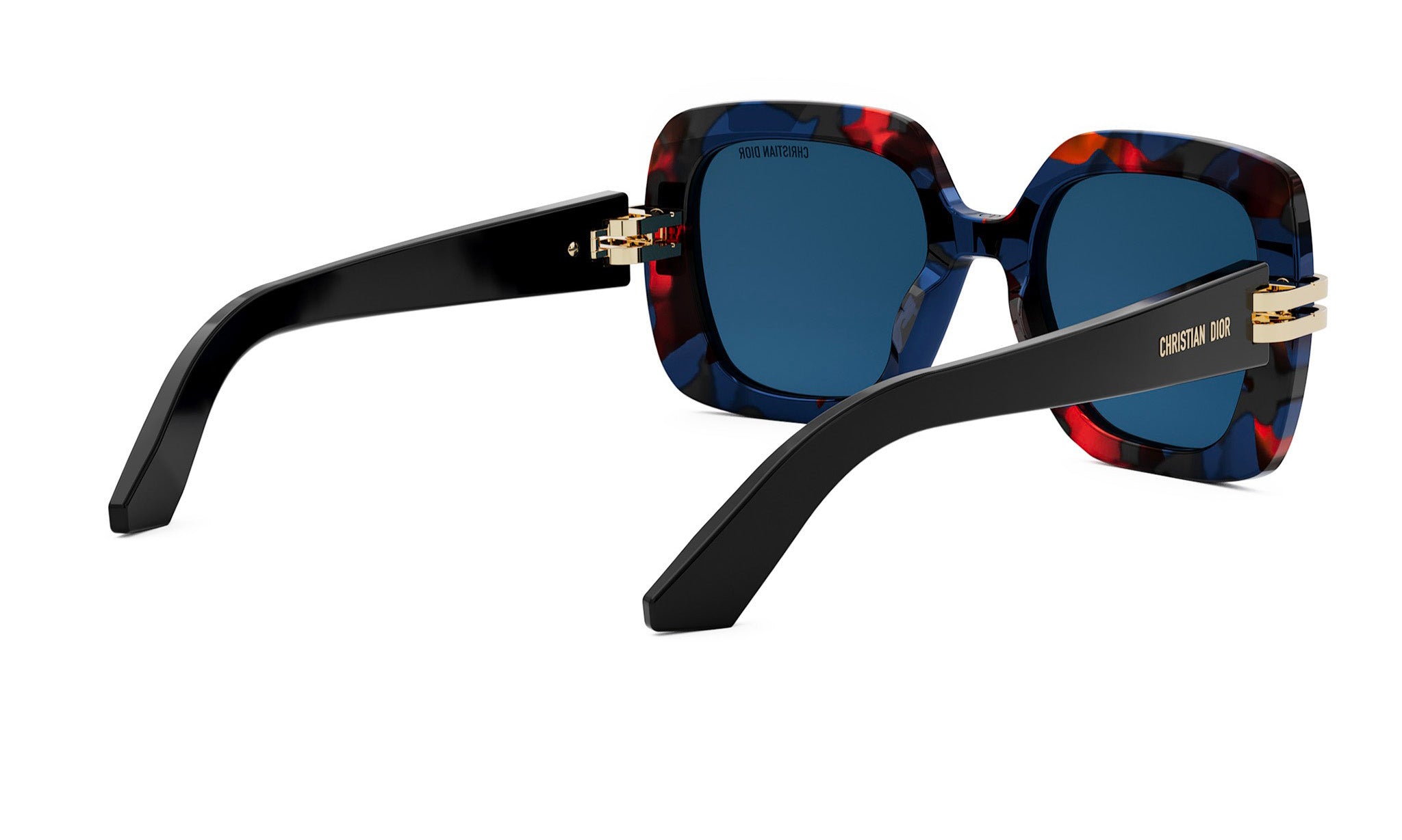 A pair of stylish sunglasses with a floral pattern and dark blue lenses.