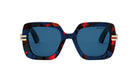 A pair of stylish sunglasses with a blue frame and red and black pattern.