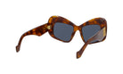A pair of stylish sunglasses with a tortoiseshell frame and dark lenses.