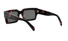 A pair of sunglasses with a tortoiseshell frame and dark lenses.