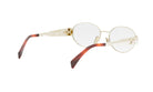 A pair of round, gold-colored sunglasses with brown accents.