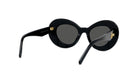 A pair of black, round sunglasses with gold accents.