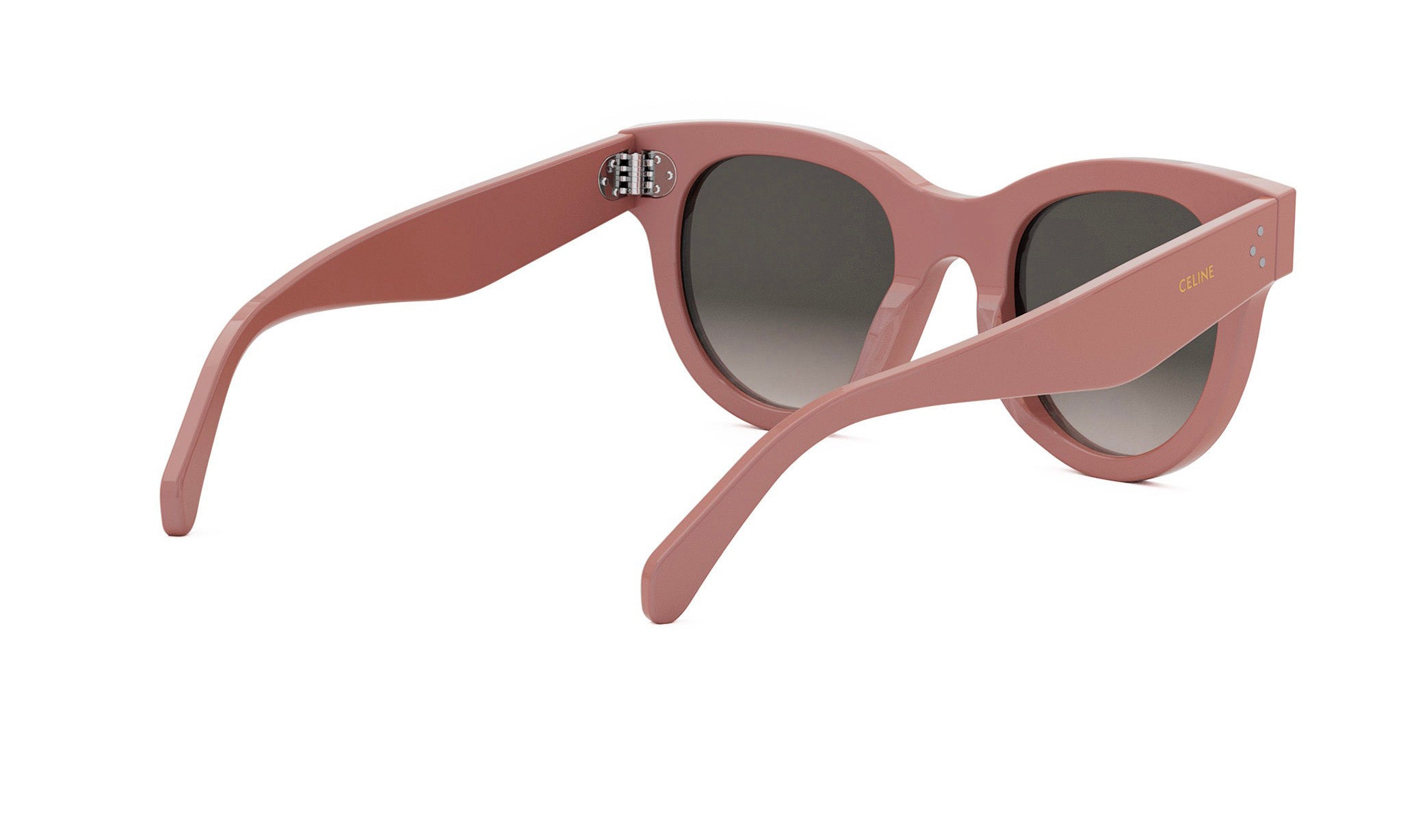 A pair of pink sunglasses with a dark lens.