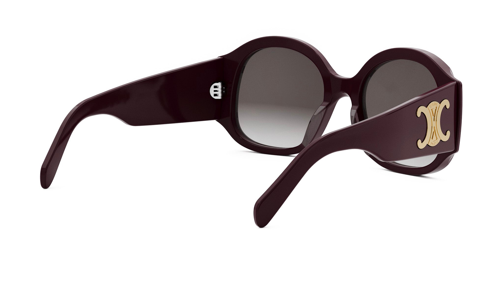 A pair of burgundy-colored sunglasses with a gold logo on the frame.