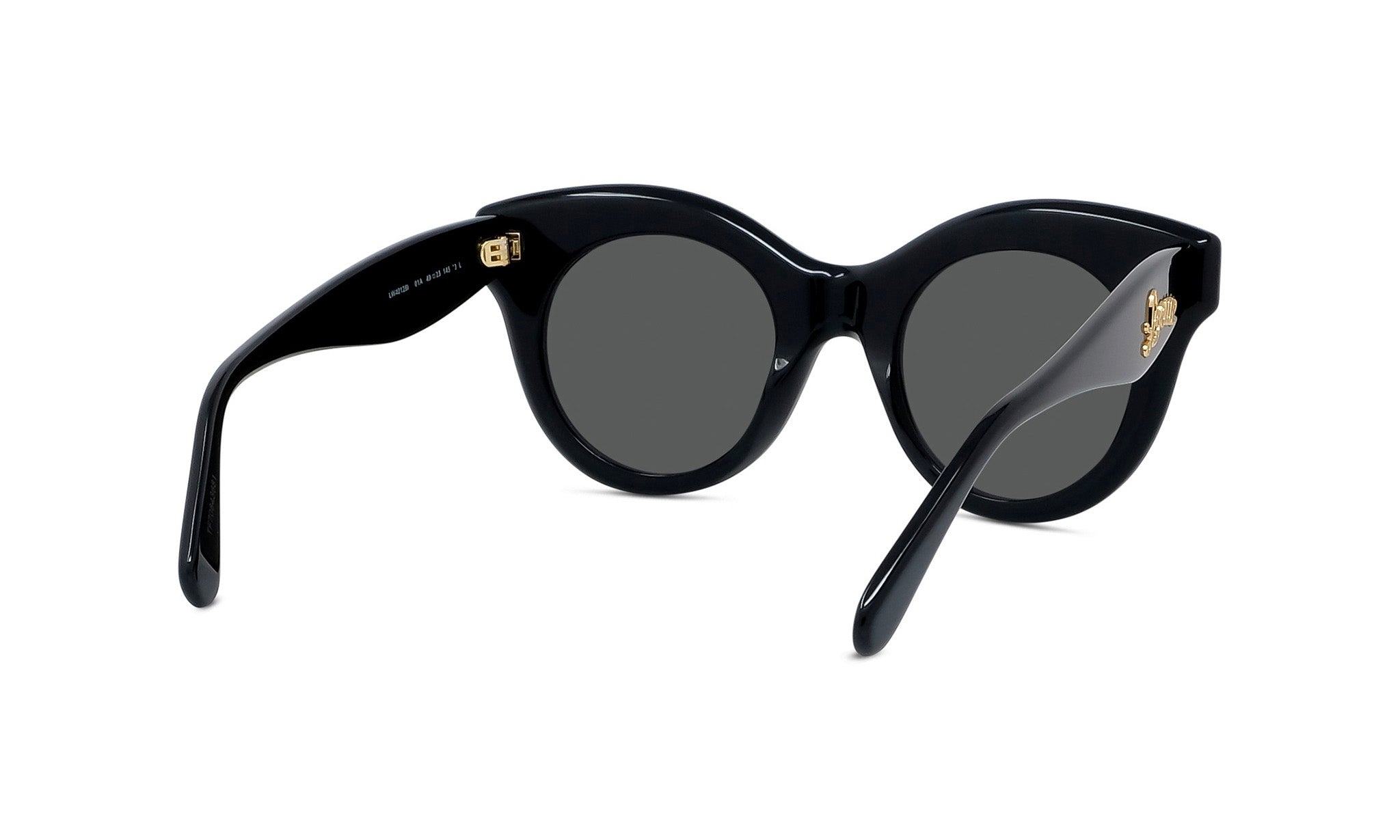 A pair of black cat-eye sunglasses with dark lenses and a gold-colored frame.