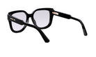 A pair of black-framed glasses with a gold-colored metal accent.