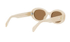 A pair of cream-colored sunglasses with a gold-colored buckle.