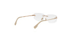 A pair of clear-framed glasses with a gold-colored frame.