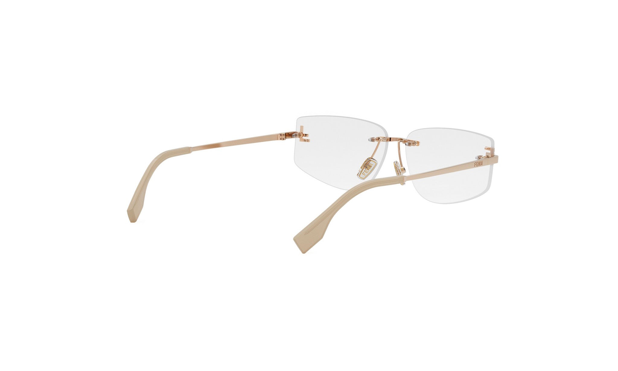 A pair of clear-framed glasses with a gold-colored frame.
