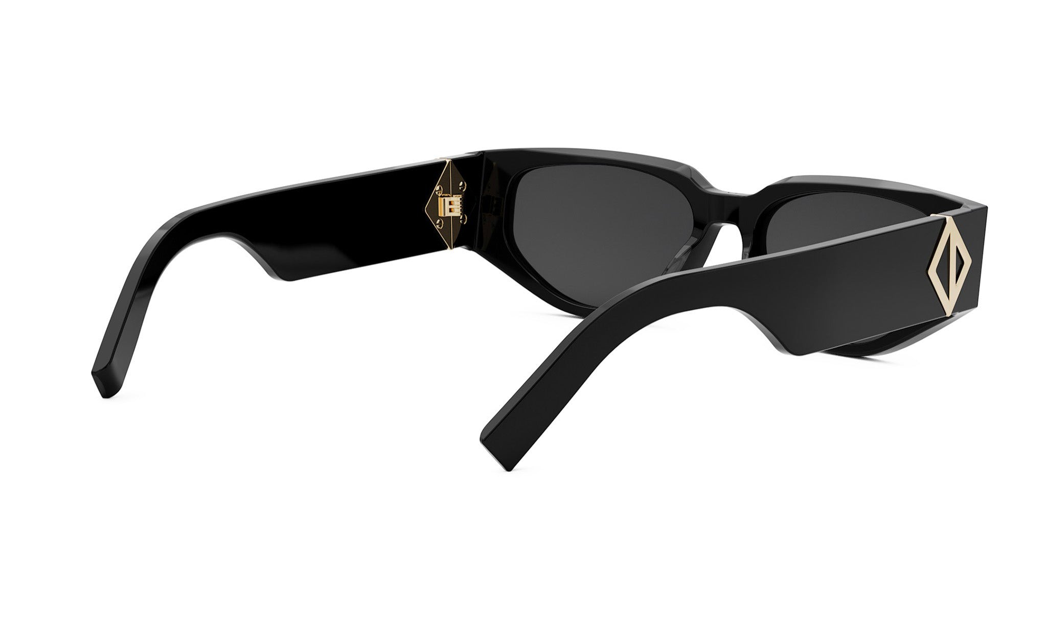 A pair of black sunglasses with a gold-colored frame and a diamond-shaped logo on the side.