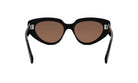 A pair of black cat-eye sunglasses with brown lenses.
