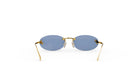 A pair of gold rimmed sunglasses with blue lenses, displayed against a white background.