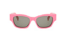 A pair of pink sunglasses with dark lenses.