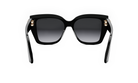A pair of black sunglasses with gold accents, featuring a sleek and stylish design.