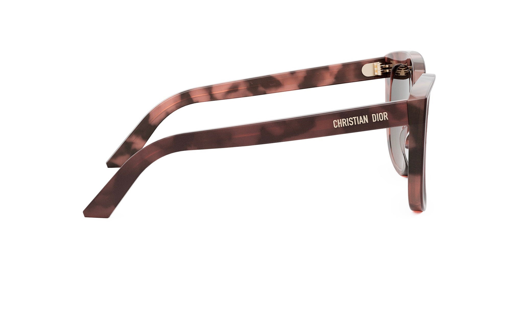 A pair of brown-tinted sunglasses with the brand name "Christian Dior" printed on the frame.