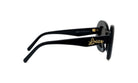 A pair of black sunglasses with gold text on the frame.