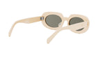 A pair of cream-colored sunglasses with dark lenses.