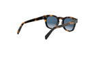 A pair of sunglasses with a tortoiseshell frame and dark blue lenses.