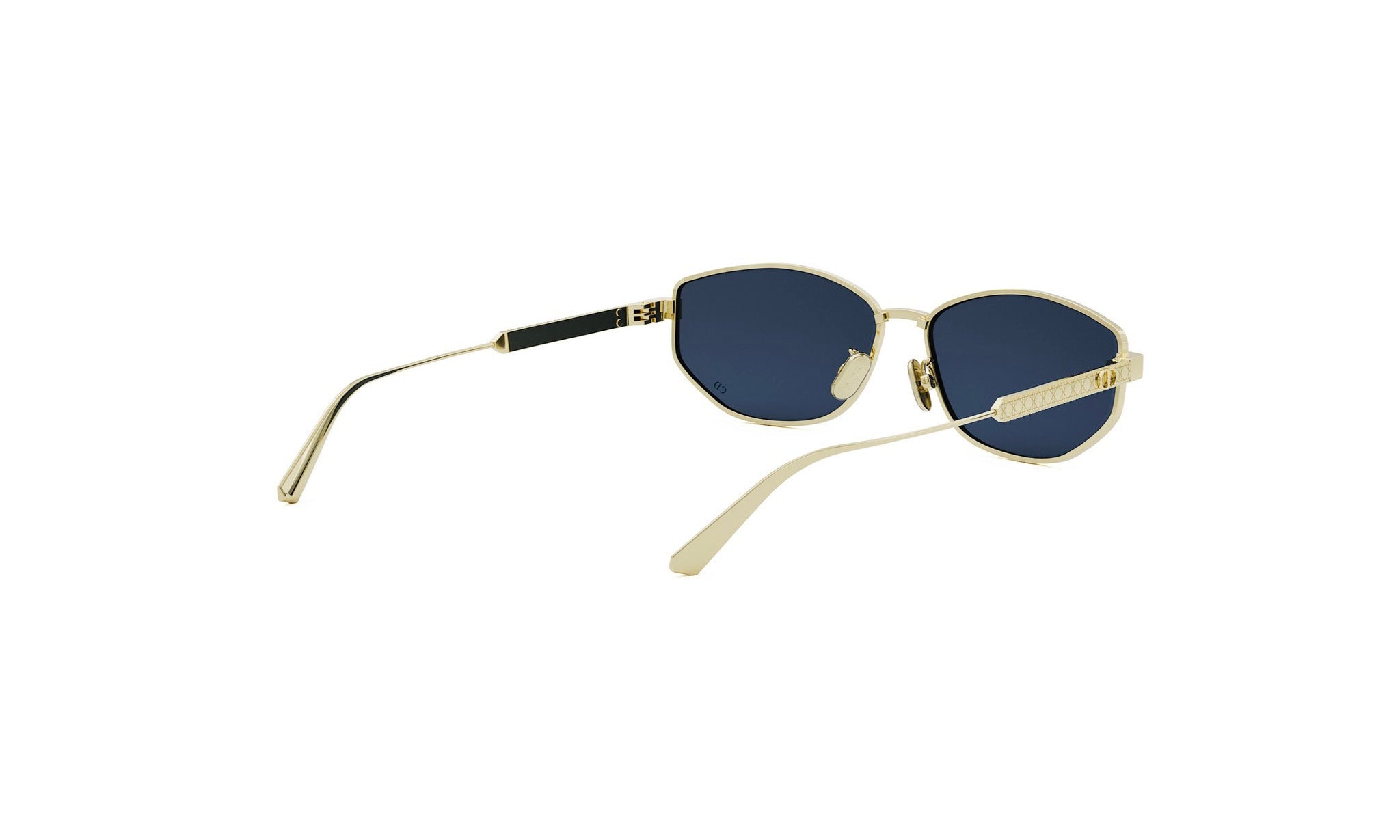 A pair of gold-colored sunglasses with dark blue lenses.