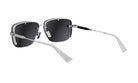 A pair of black-framed sunglasses with white accents, positioned on a white background.
