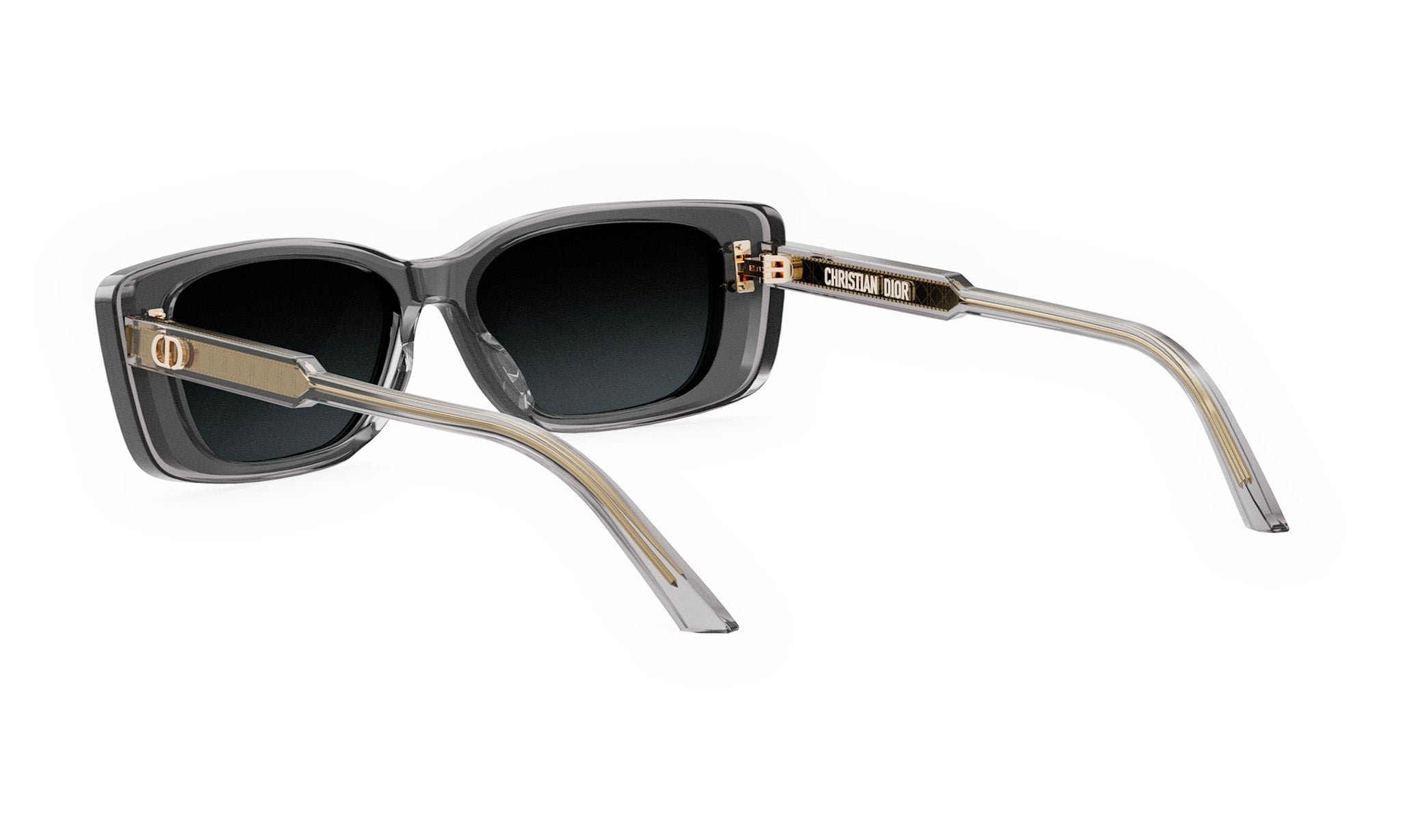 A pair of stylish sunglasses with a dark frame and gold accents.
