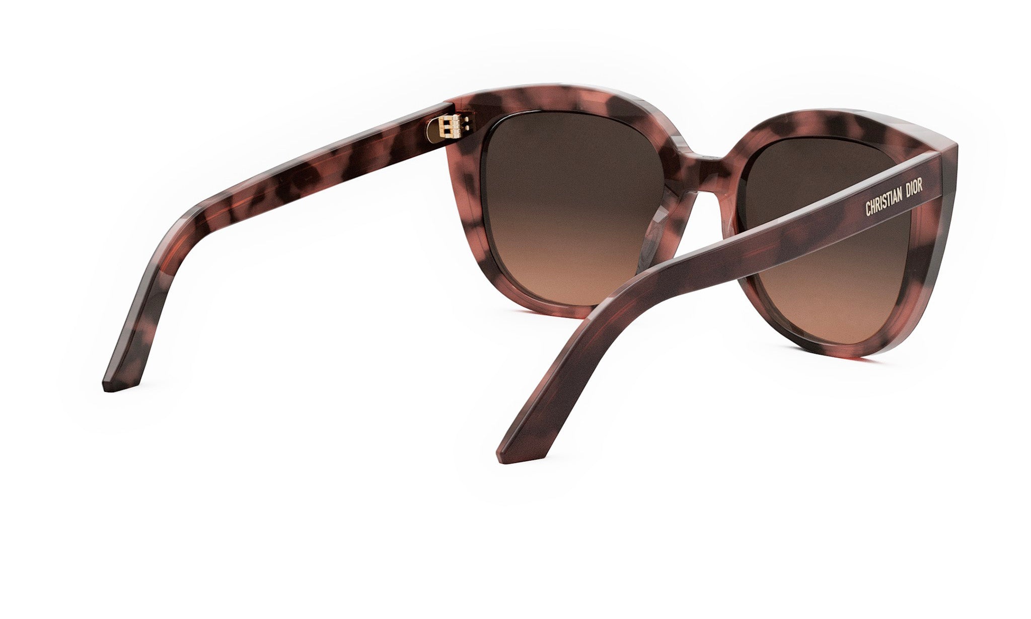 A pair of sunglasses with a tortoiseshell frame and dark lenses.