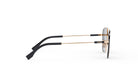 A pair of Fendi sunglasses with gold-colored metal arms and black frames.