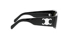 A pair of black sunglasses with a white logo on the frame.